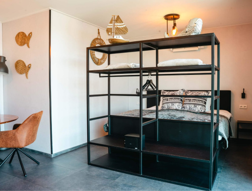 Bed van Familie suite 4 personen in Hotel Biesbosch