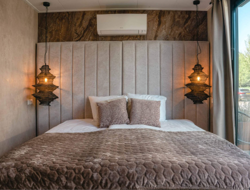 Bed van de Studio Kamer 27m2 | Hotel Biesbosch